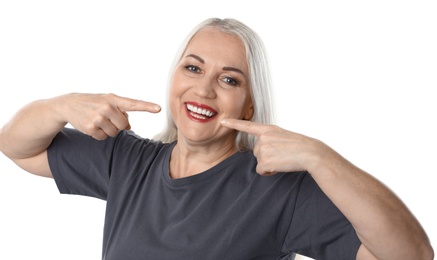 Photo of Smiling woman with perfect teeth on white background