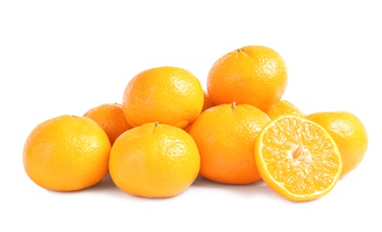 Photo of Tasty ripe tangerines on white background. Citrus fruit