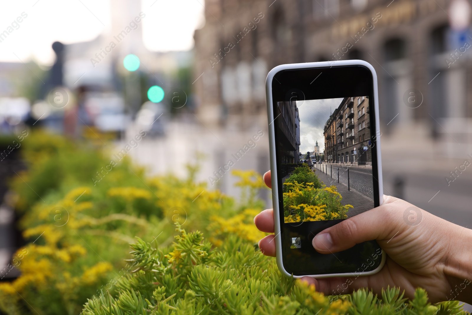 Photo of Woman taking picture of beautiful city, closeup. Space for text