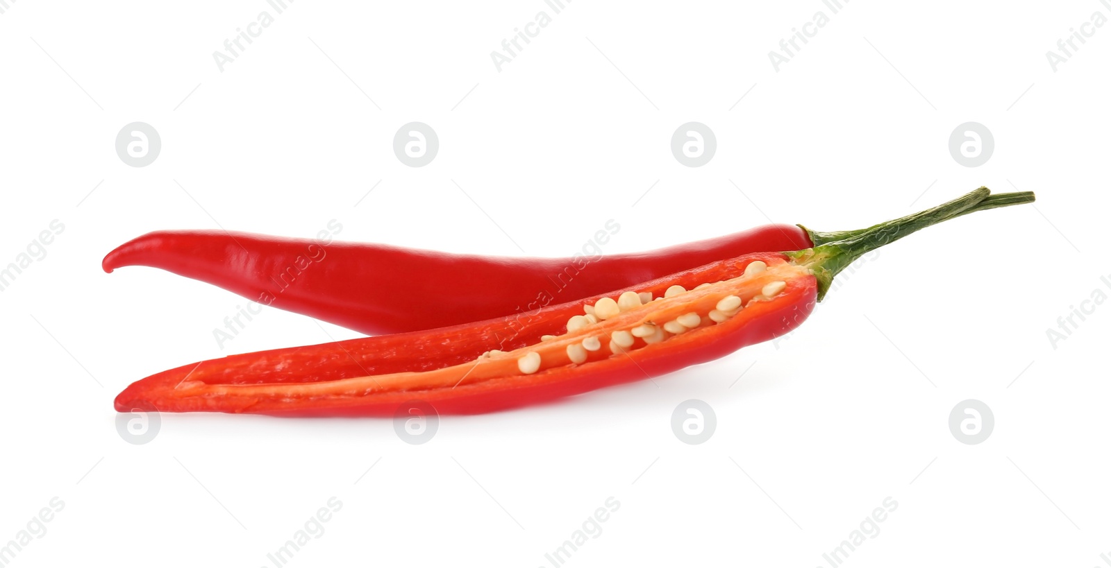 Photo of Cut ripe chili pepper on white background