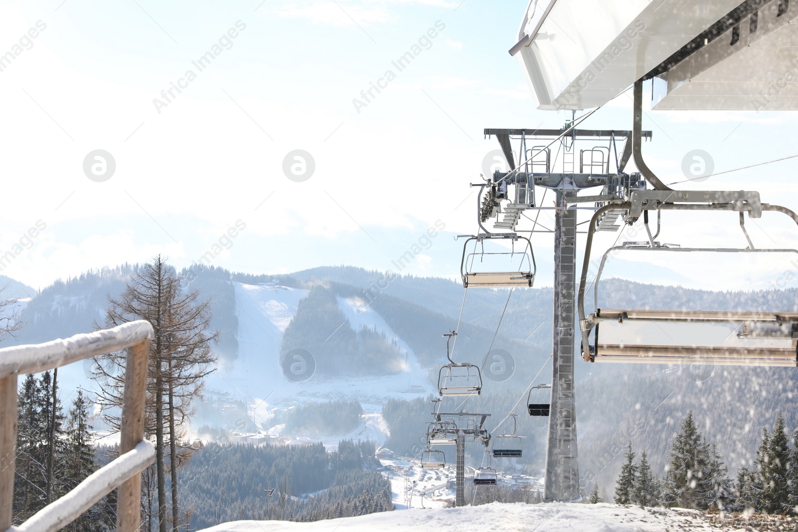 Photo of Beautiful mountain landscape with chairlift. Winter vacation