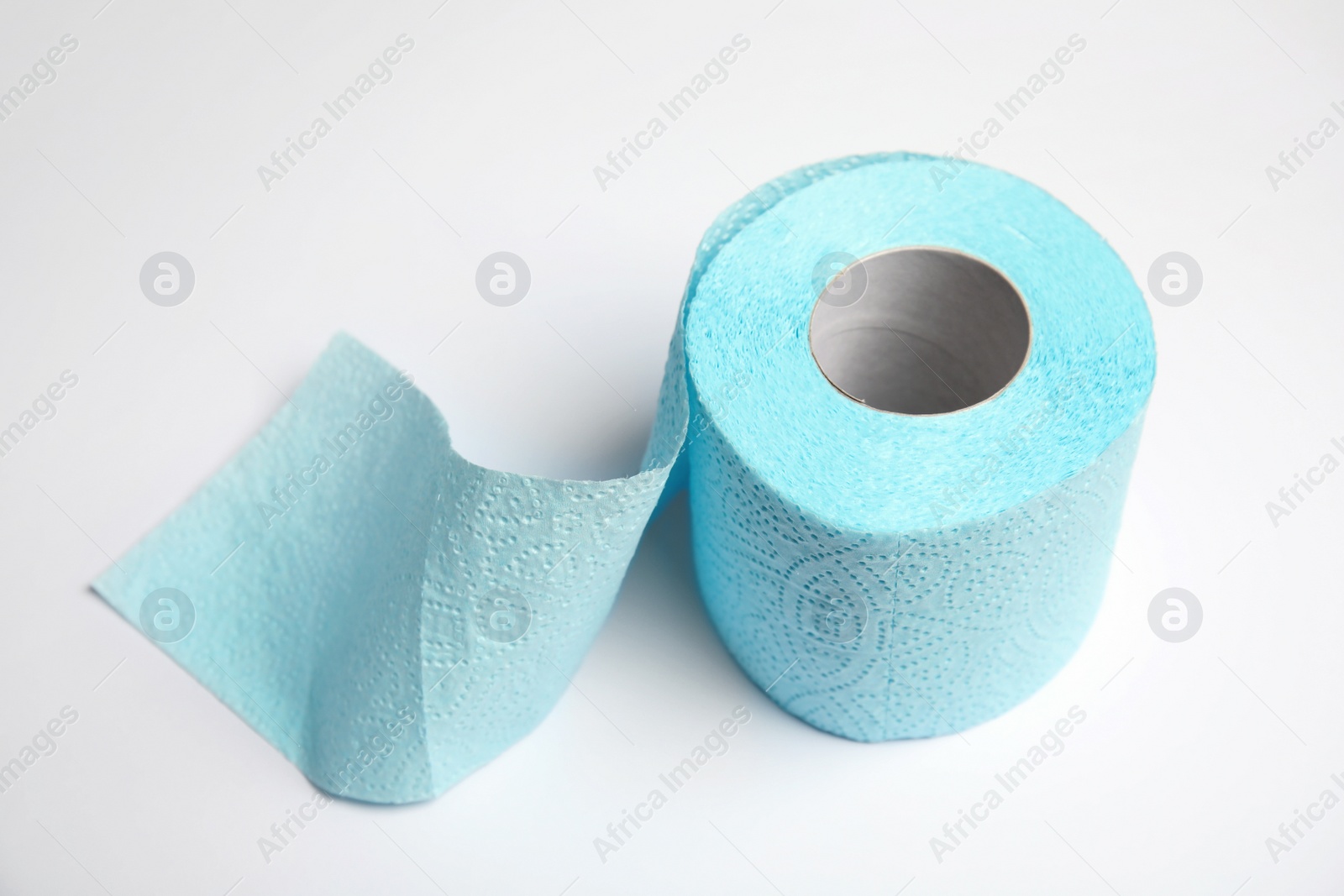 Photo of Toilet paper roll on white background. Personal hygiene