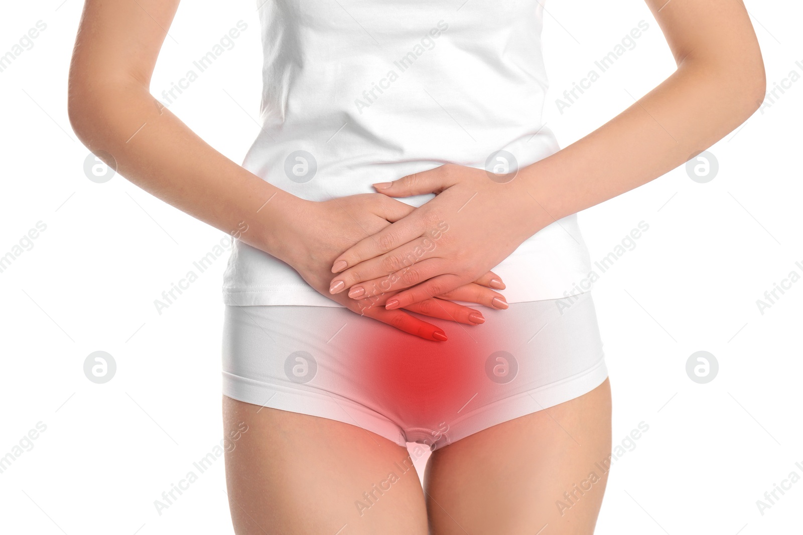 Image of Woman holding hands on her belly against white background, closeup. Vaginal yeast infection