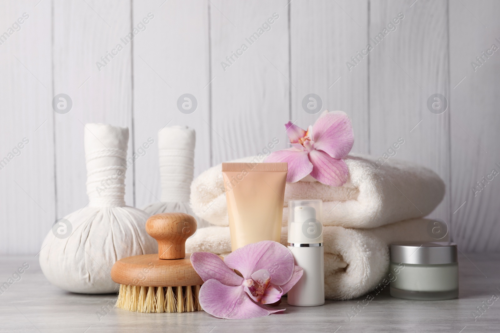 Photo of Beautiful composition with different spa products on light gray table