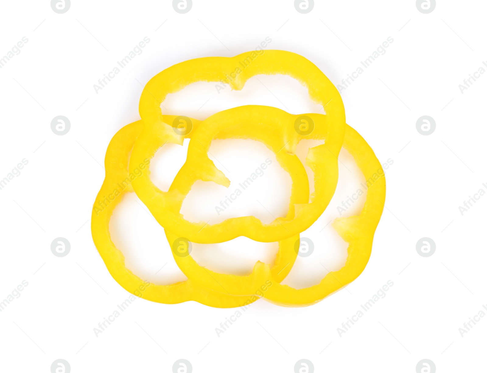 Photo of Rings of yellow bell pepper isolated on white, top view