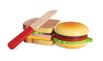 Photo of Toy burger, sandwich and knife on white background
