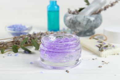 Photo of Homemade lavender gel on white wooden table, closeup
