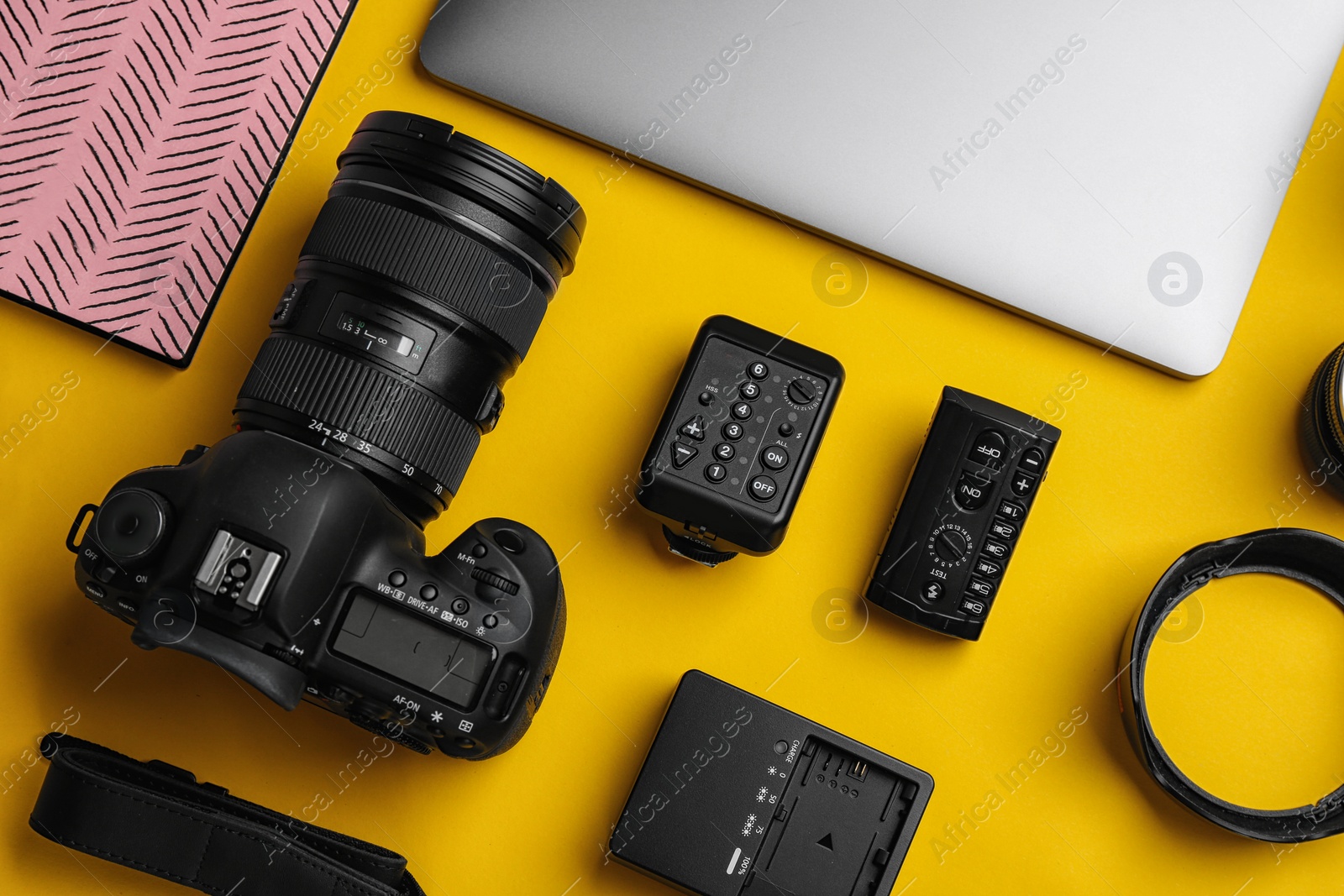 Photo of Flat lay composition with photographer's equipment and accessories on color background