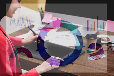 Image of Female designer working at desk and illustration of colorful graphs. Double exposure