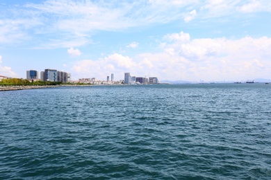 Photo of Beautiful view of city on sea shore