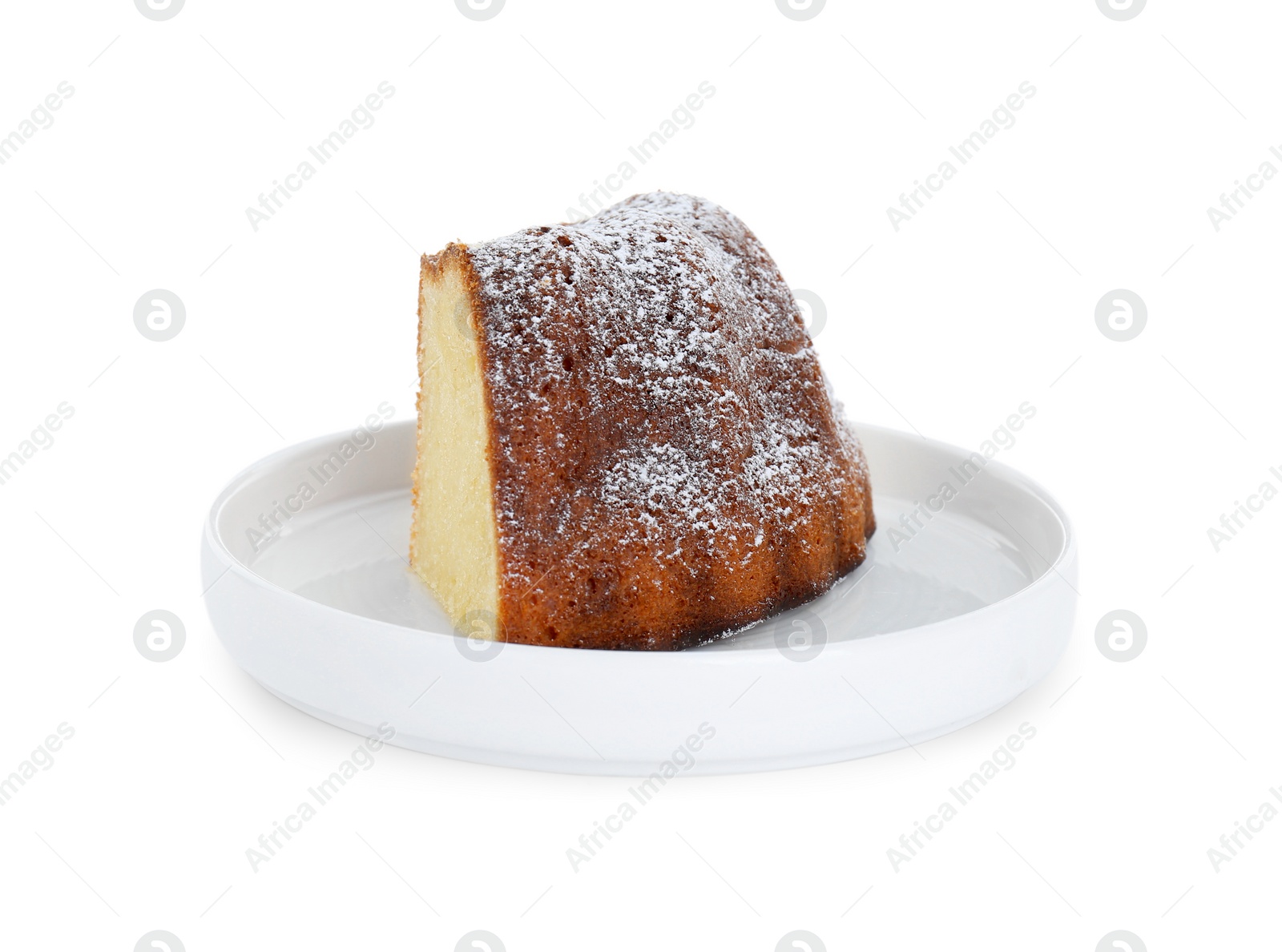 Photo of Piece of homemade yogurt cake with powdered sugar on white background