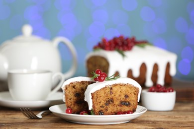 Traditional Christmas cake on wooden table. Classic recipe
