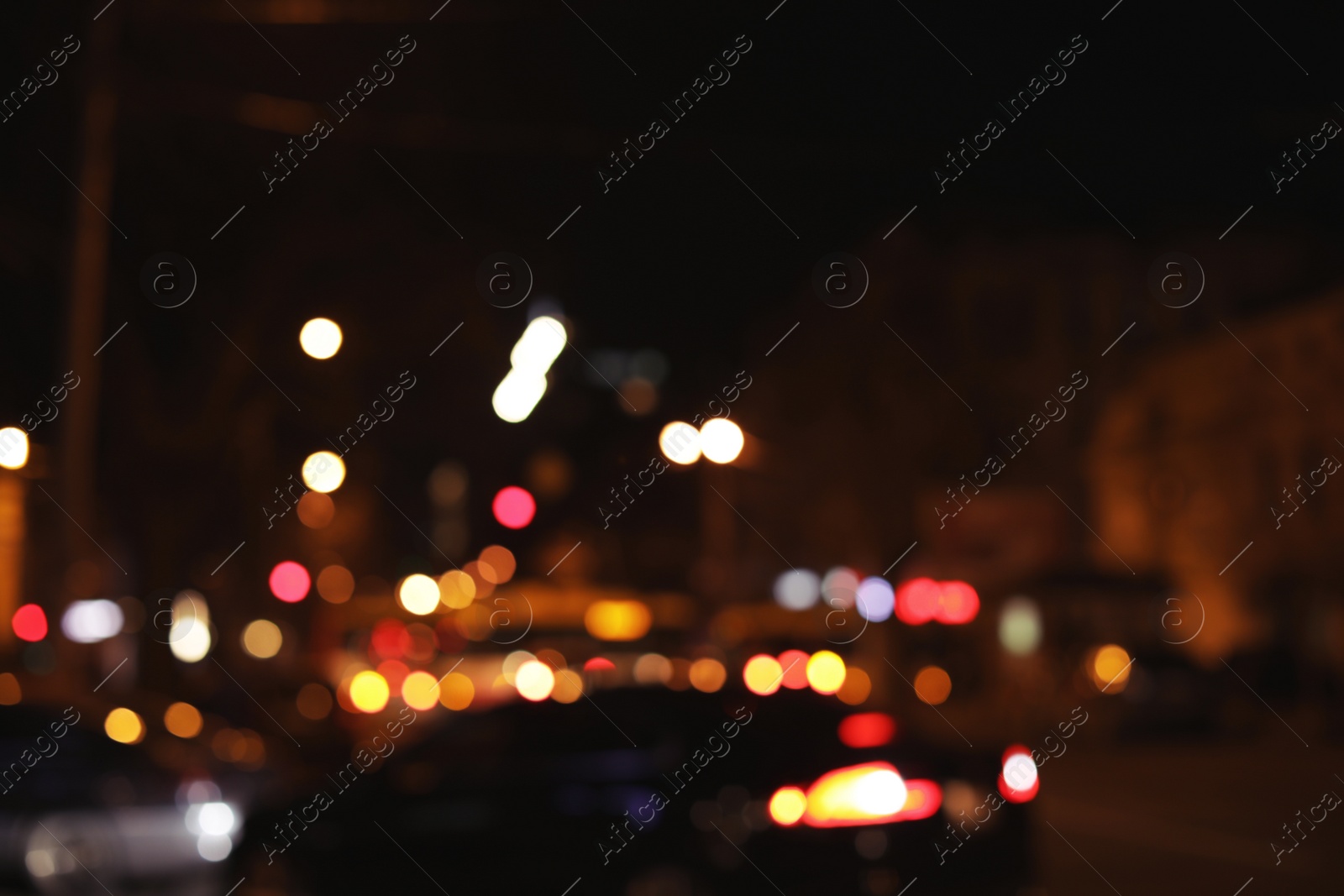 Photo of Beautiful street lights at night. Bokeh effect