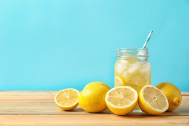 Natural lemonade in mason jar on wooden table