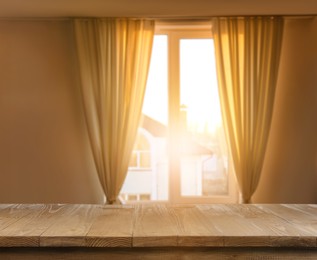 Image of Empty wooden surface in room. Mockup for design