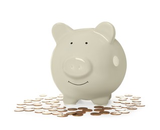 Piggy bank and coins on white background