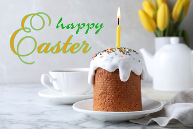 Image of Happy holiday. Beautiful Easter cake with candle on white marble table