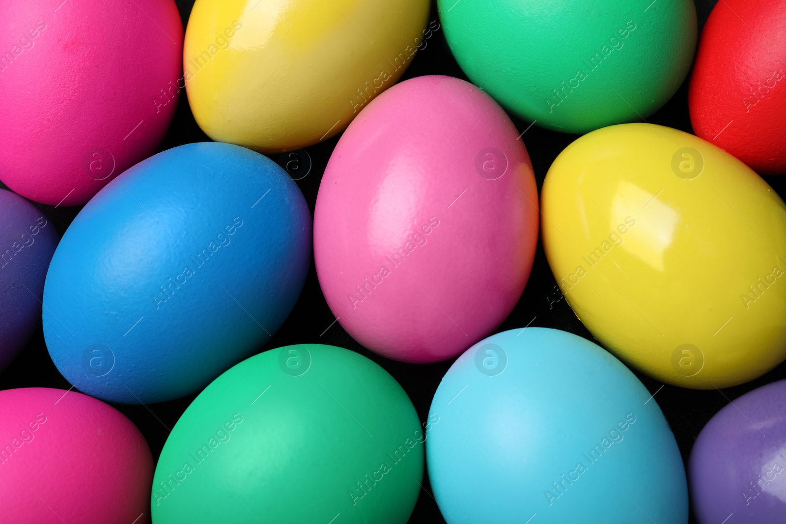 Photo of Colorful eggs as background, closeup. Happy Easter