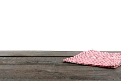 Photo of Napkin on wooden table against white background. Space for text