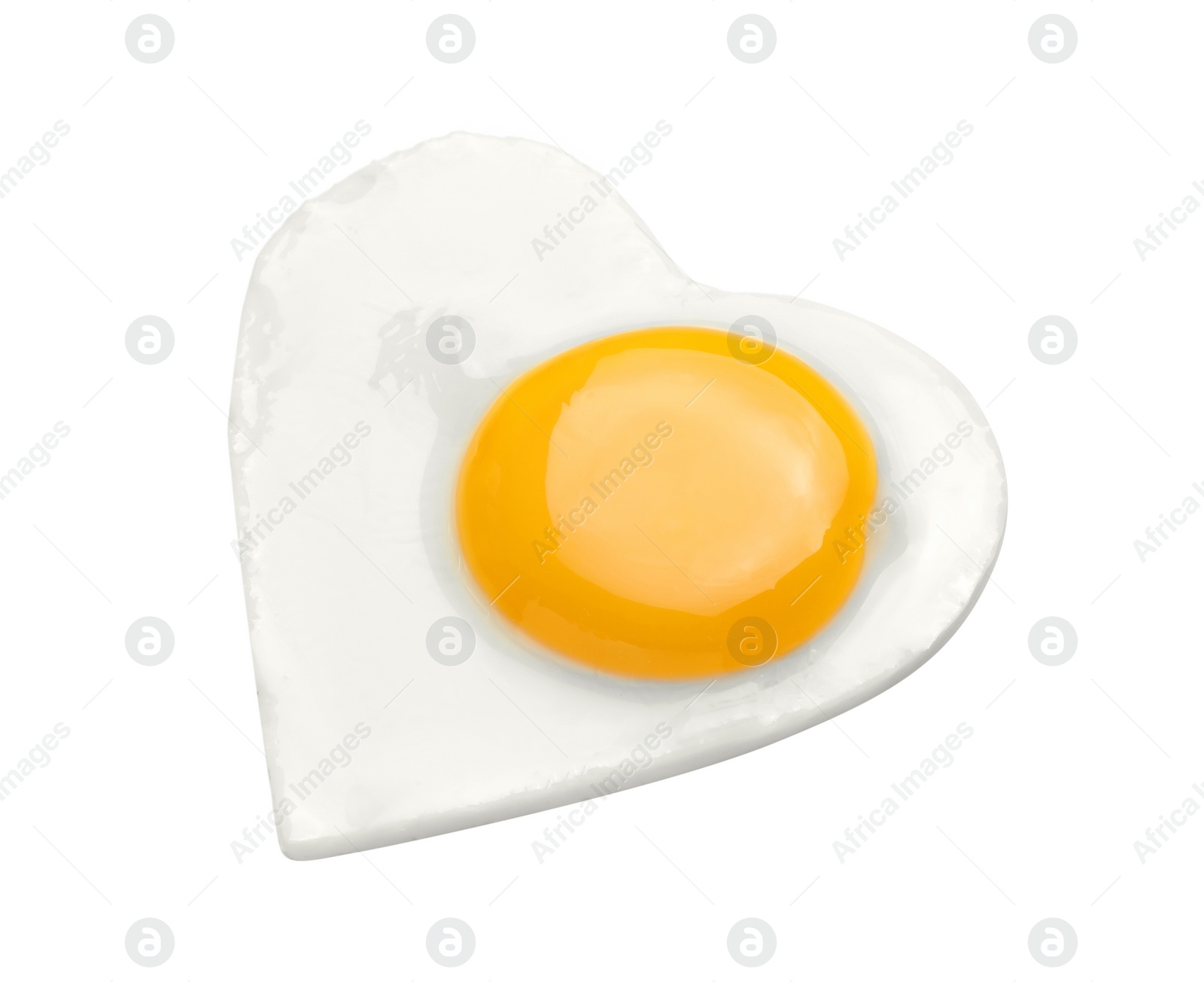Photo of Heart shaped fried egg isolated on white