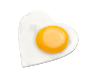 Photo of Heart shaped fried egg isolated on white