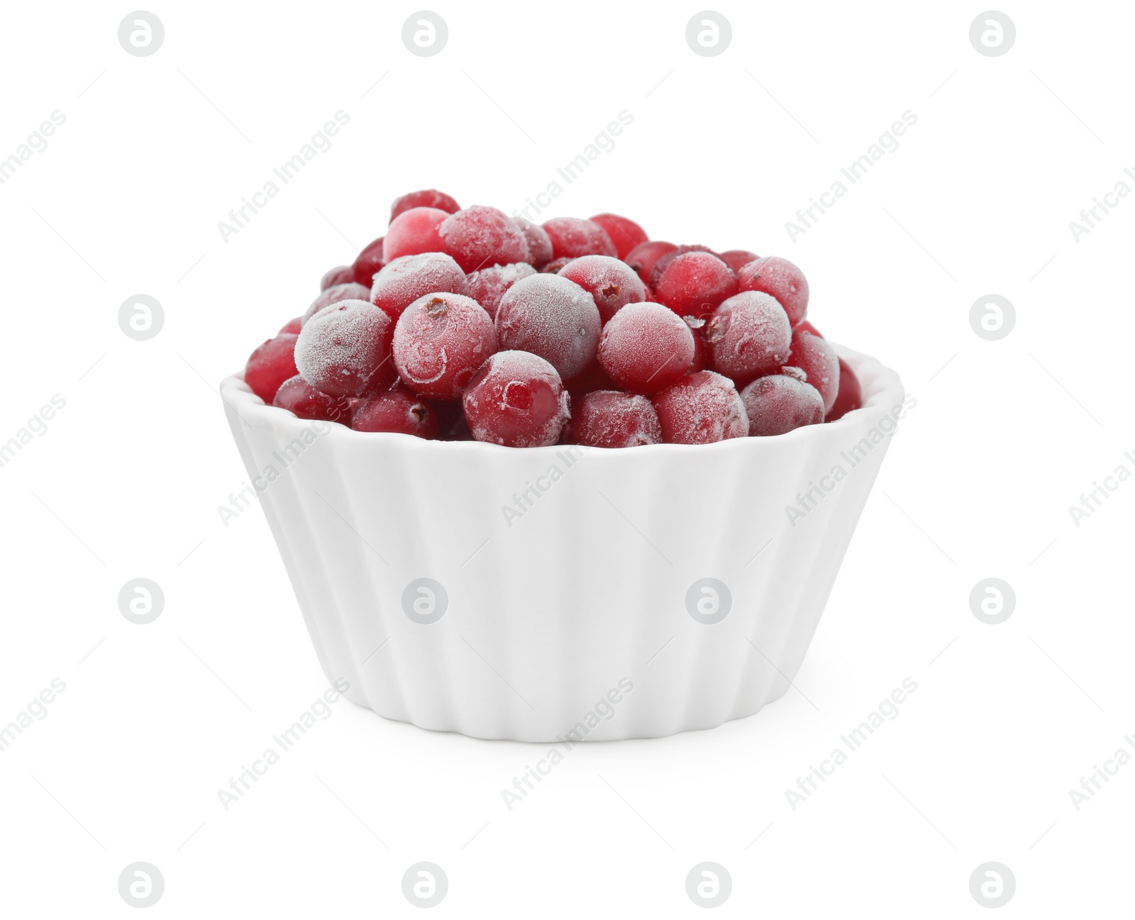 Photo of Frozen red cranberries in bowl isolated on white