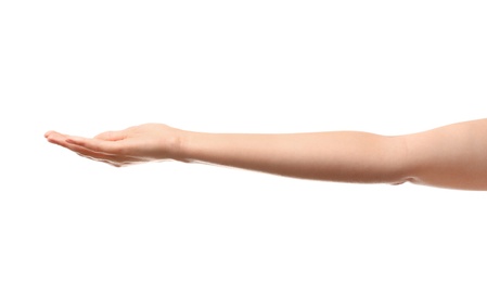 Photo of Young woman holding something on white background, closeup