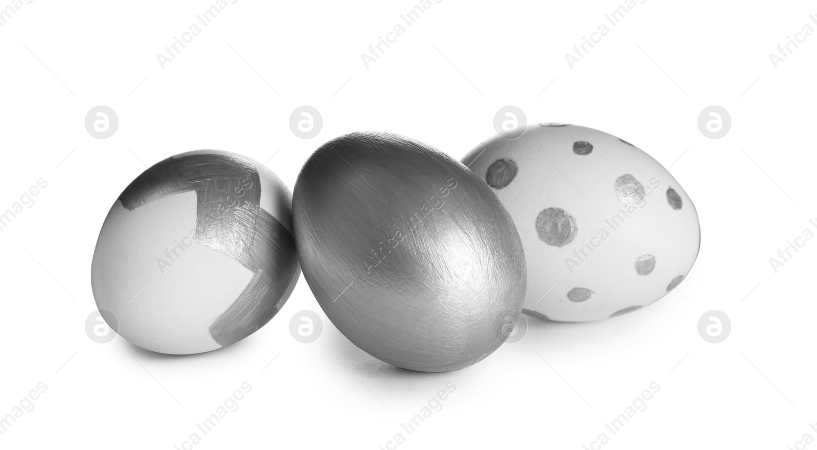 Photo of Painted Easter eggs on white background. Stylish design