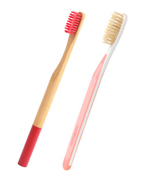 Image of Different natural toothbrushes on white background 