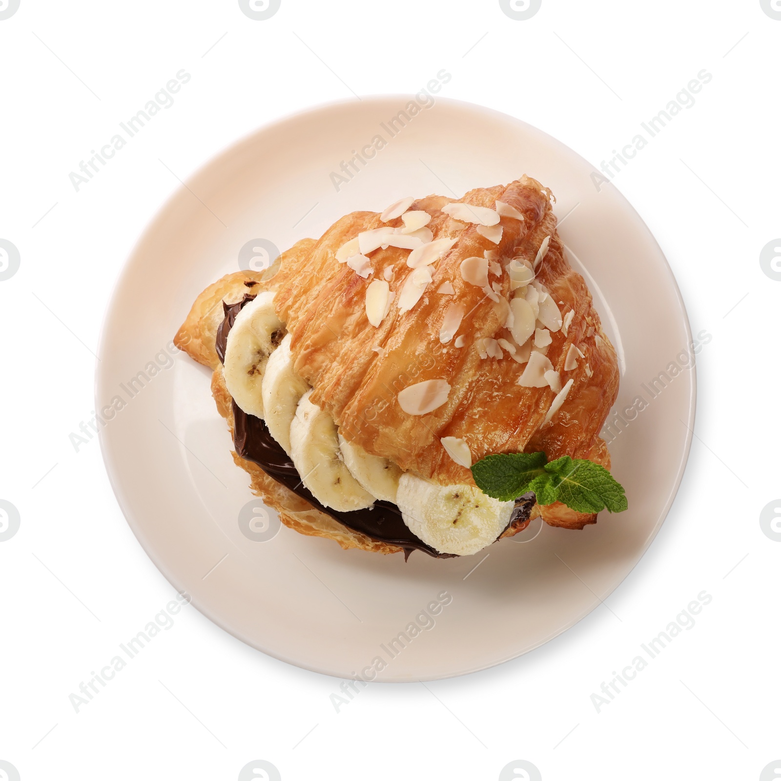Photo of Delicious croissant with banana, chocolate and mint isolated on white, top view