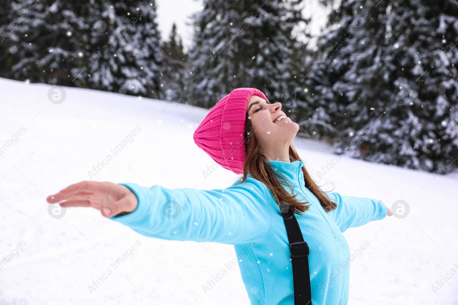 Photo of Young woman at mountain resort. Winter vacation