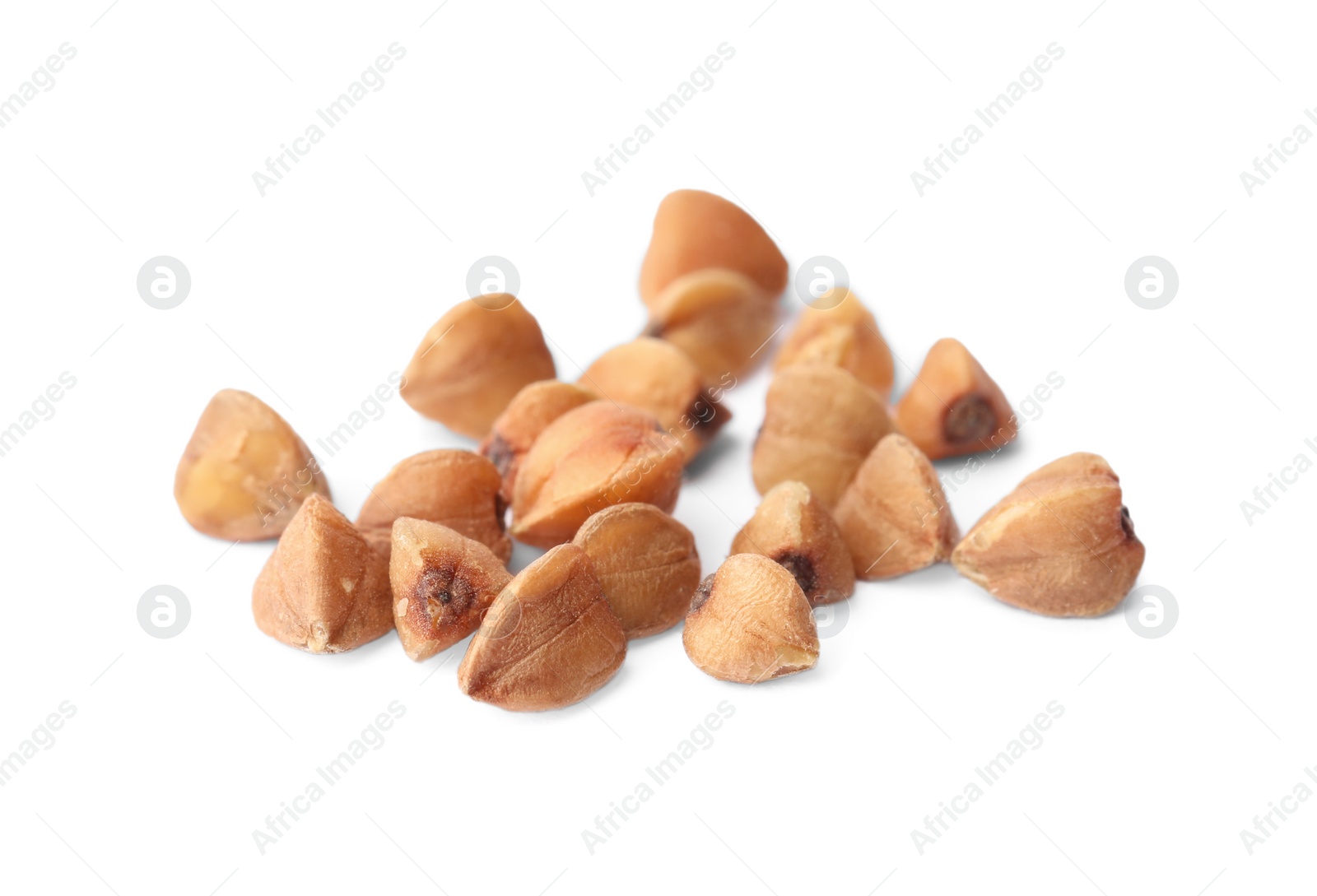 Photo of Buckwheat grains isolated on white. Organic cereal