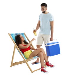 Photo of Happy man with cool box giving bottle of beer to his girlfriend on white background