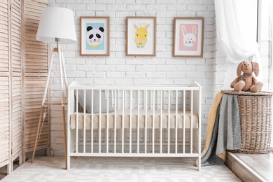 Modern baby room interior with crib