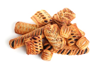 Photo of Heap of fresh tasty puff pastries on white background, top view