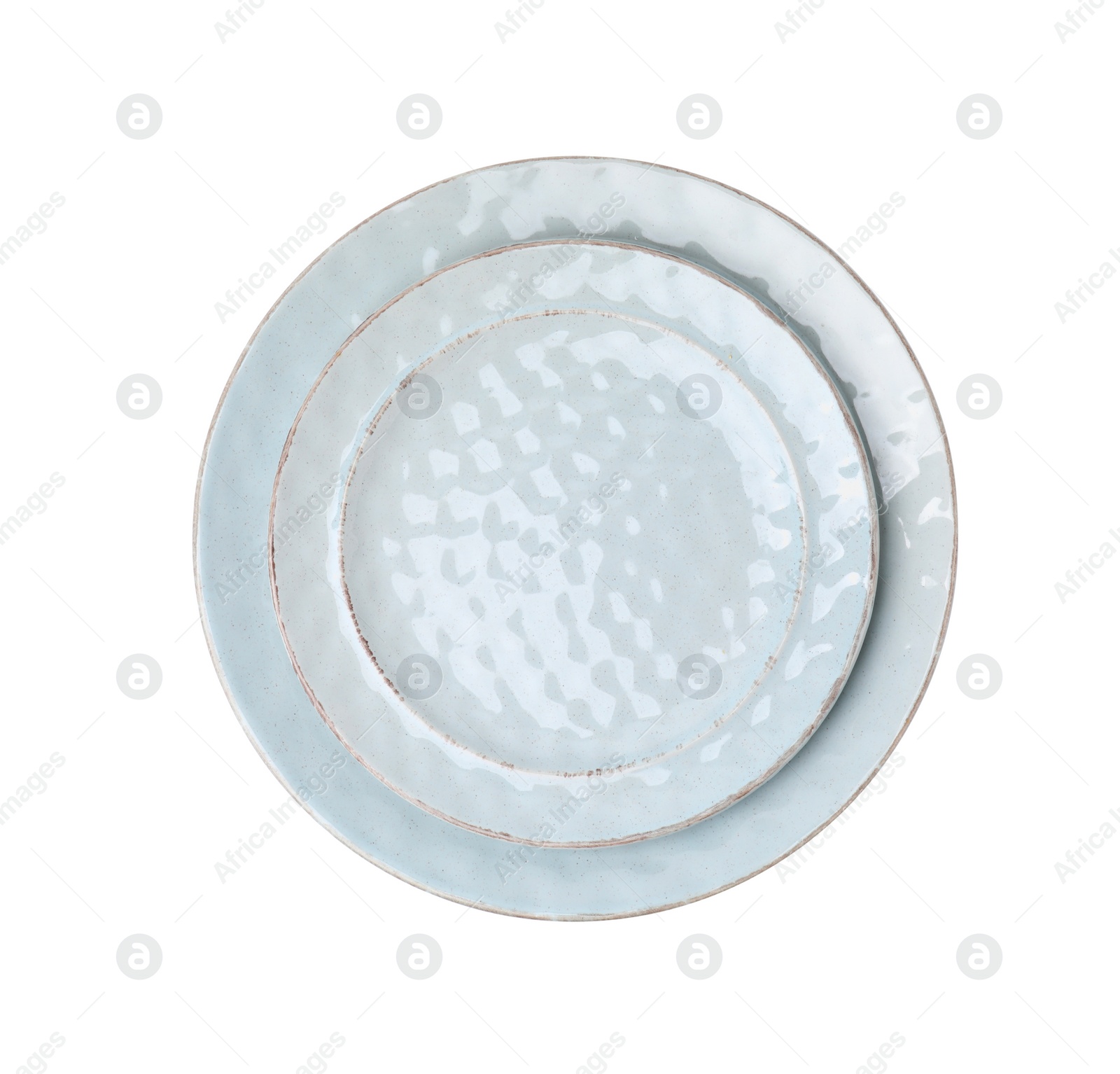 Photo of Two ceramic plates isolated on white, top view. Cooking utensils