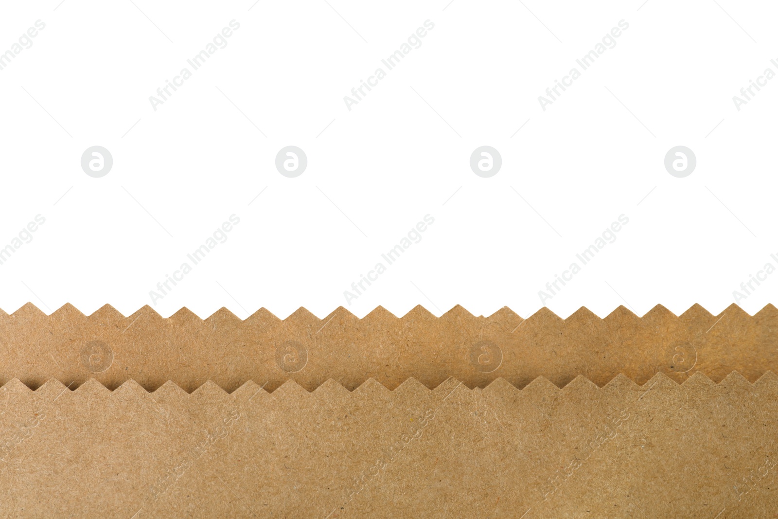 Photo of Kraft paper bag on white background, closeup