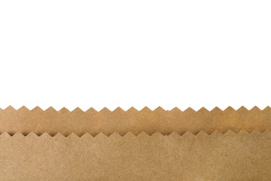 Photo of Kraft paper bag on white background, closeup