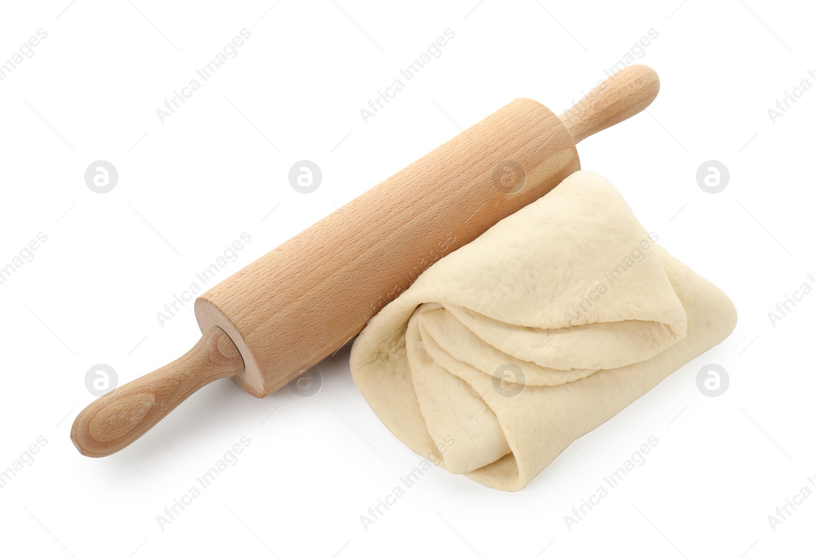 Photo of Raw dough and rolling pin isolated on white