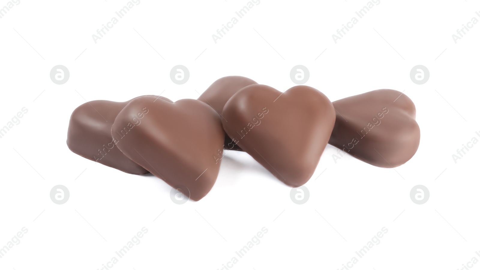 Photo of Beautiful heart shaped chocolate candies on white background