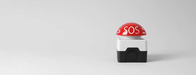 Image of Red SOS button on white background. Banner design with space for text