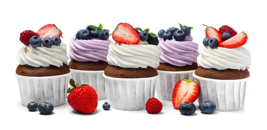 Photo of Sweet cupcakes with fresh berries on white background