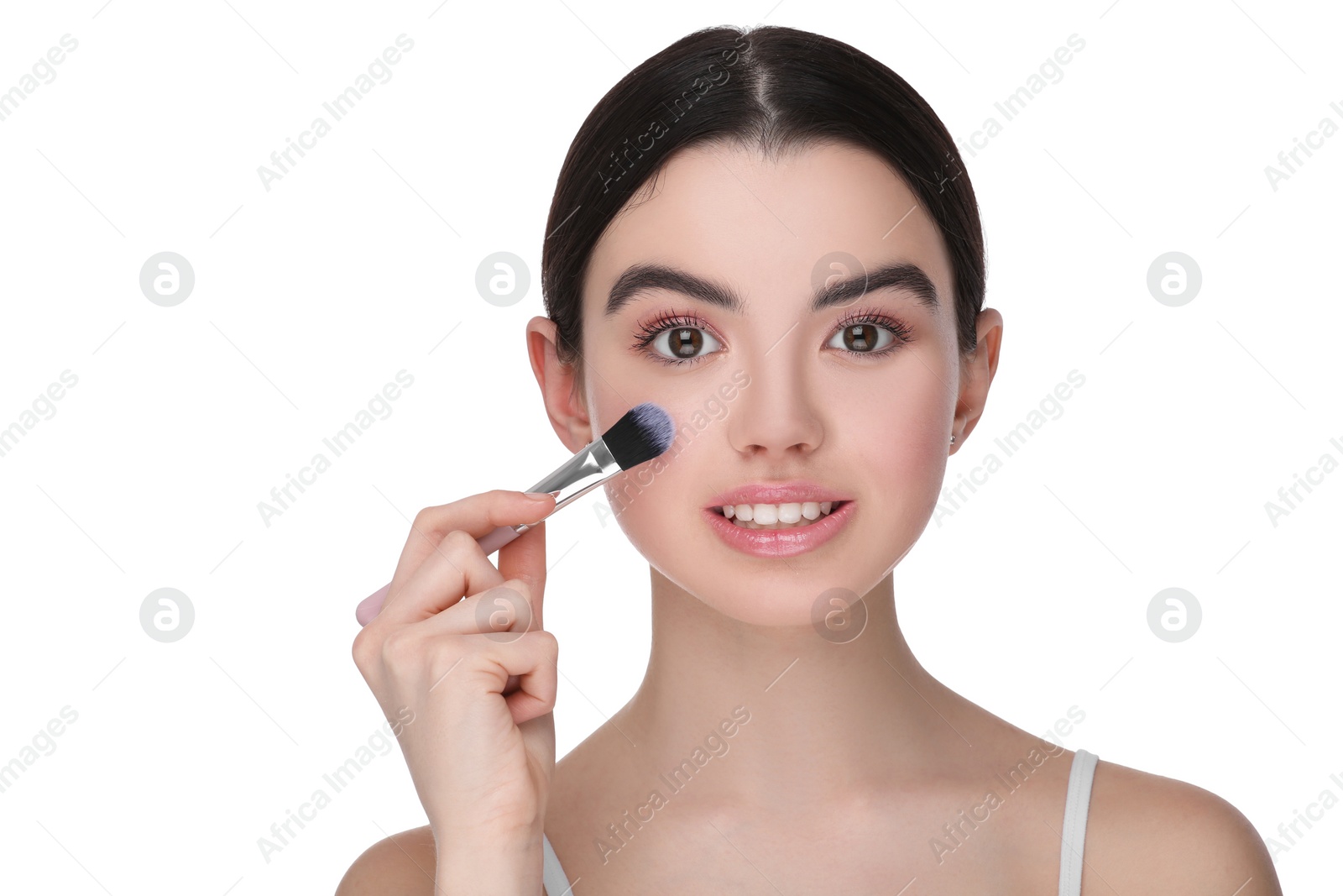 Photo of Teenage girl with makeup brush on white background