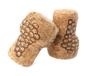 Photo of Two sparkling wine corks with grape images on white background