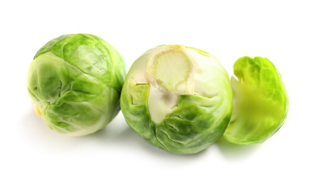 Photo of Fresh tasty Brussels sprouts on white background