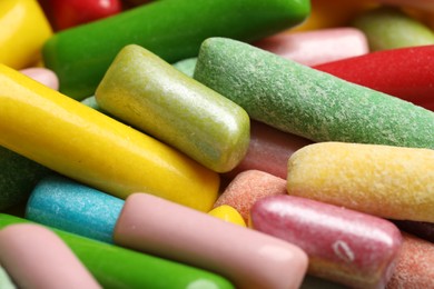 Photo of Many tasty bubble gums as background, closeup