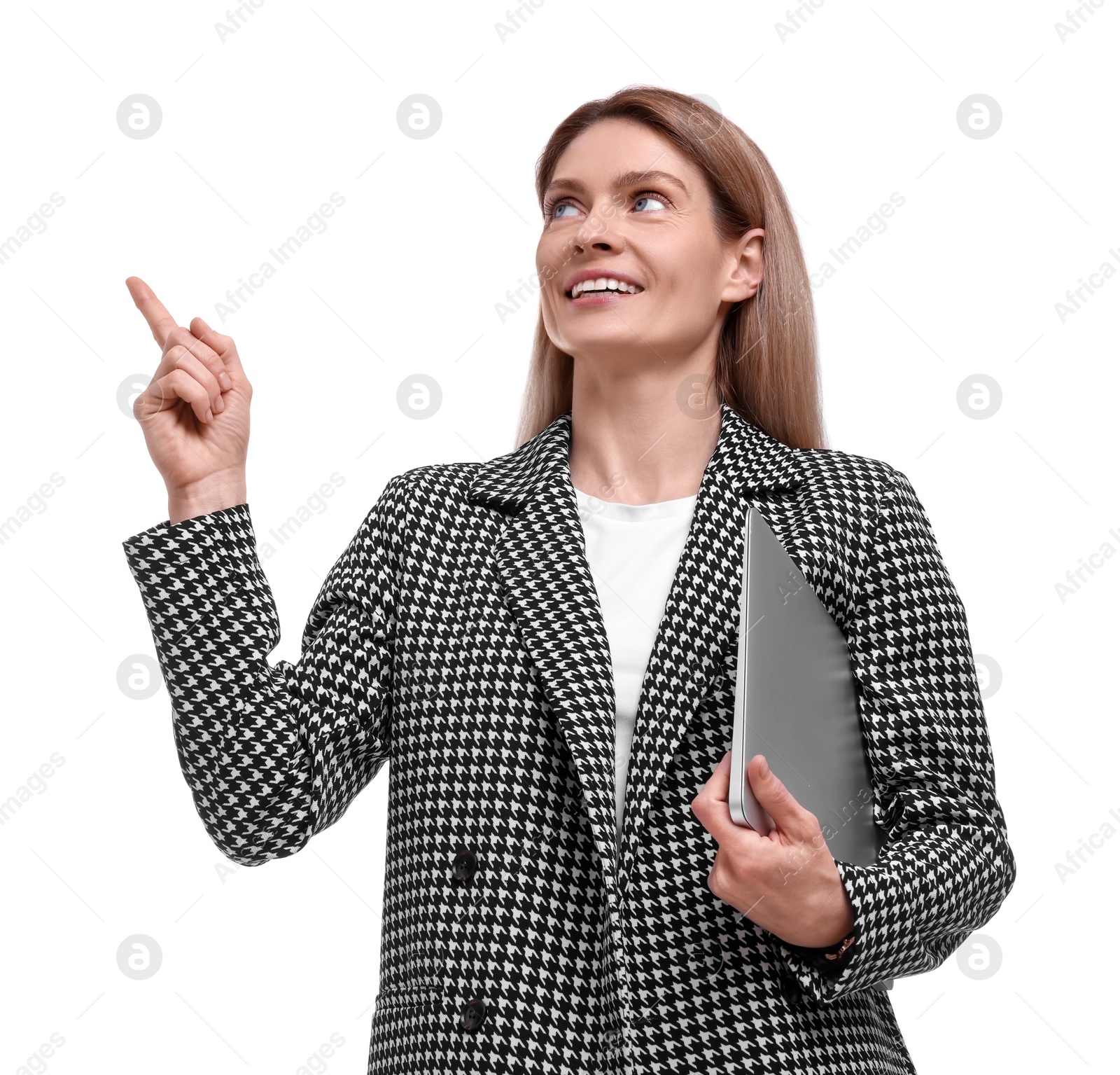 Photo of Beautiful happy businesswoman with laptop pointing at something on white background