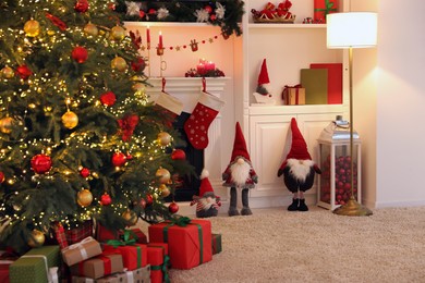 Living room interior with fireplace and festive decor. Christmas celebration