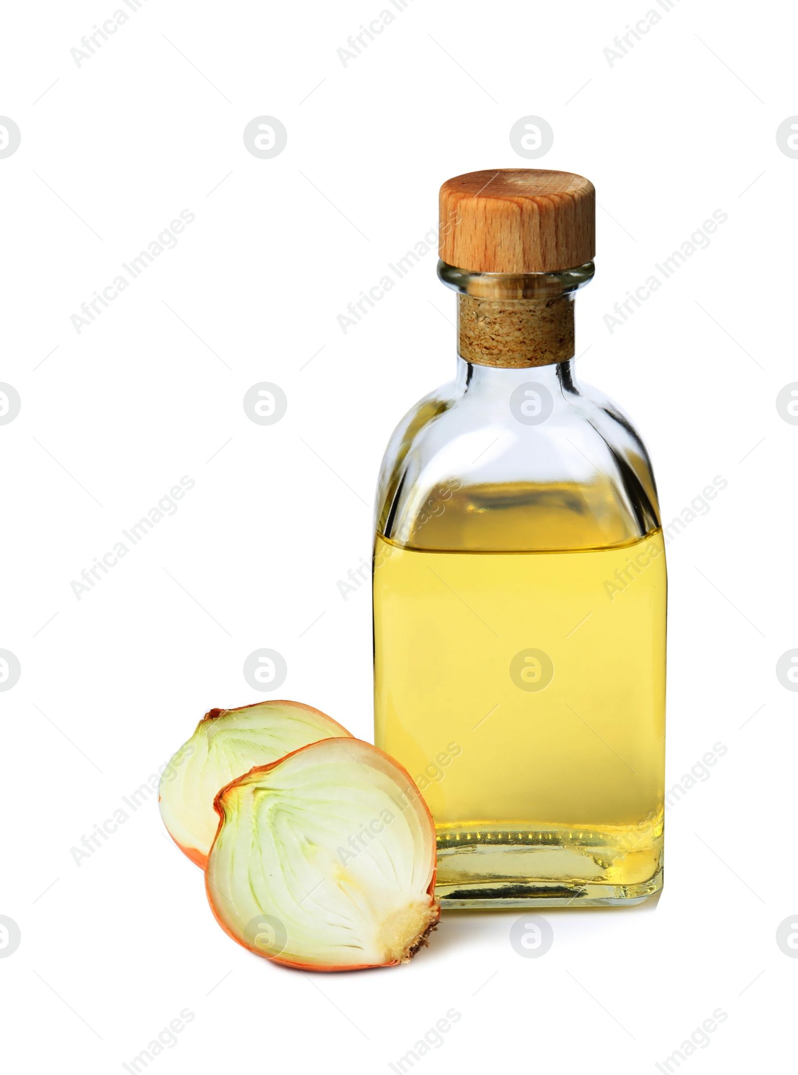 Photo of Glass bottle of onion syrup and fresh ingredient on white background