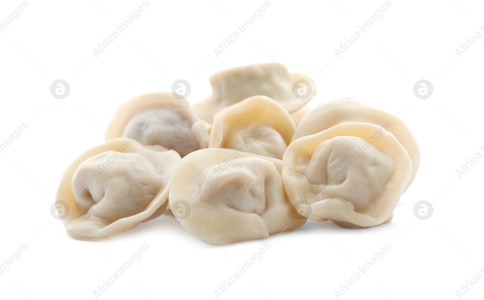 Photo of Pile of boiled dumplings on white background